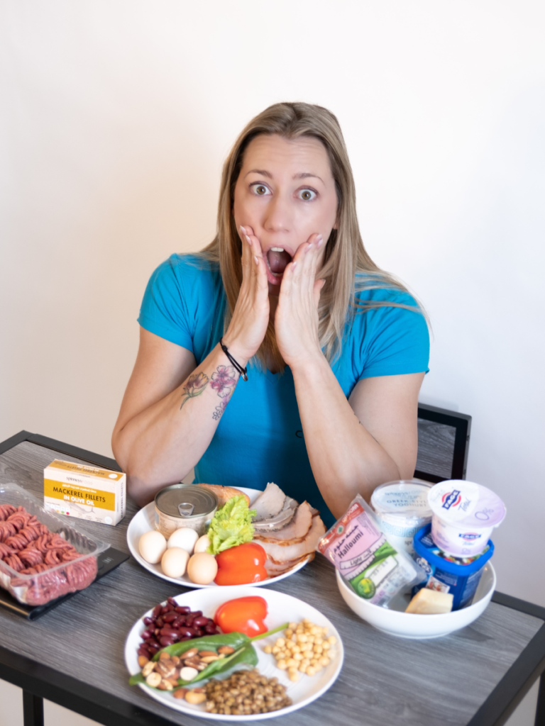 Blond lady surprised with lots of protein sources